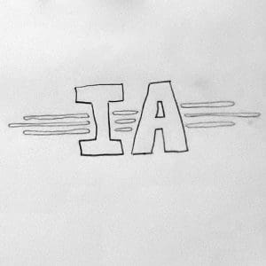 An early option for the Inteligencia Automovil Logo done with block letters and 3 horizontal lies behind, inspired by designs like Top Gun