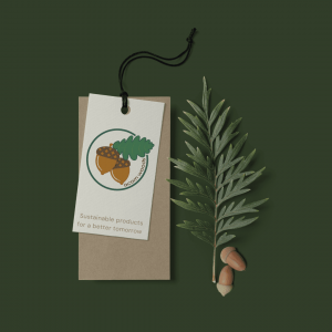 Acorn Wood Logo displayed on Sales Tags along side a pair of acorns and a fern leaf